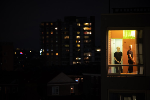 From outside: The Cabanon and its large window glow in the night sky of Rotterdam., Picturerights © Ossip van Duivenbode